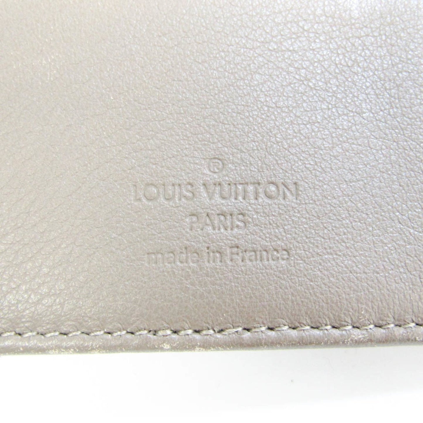 Louis Vuitton Beige Leather Mahina wallet accessories