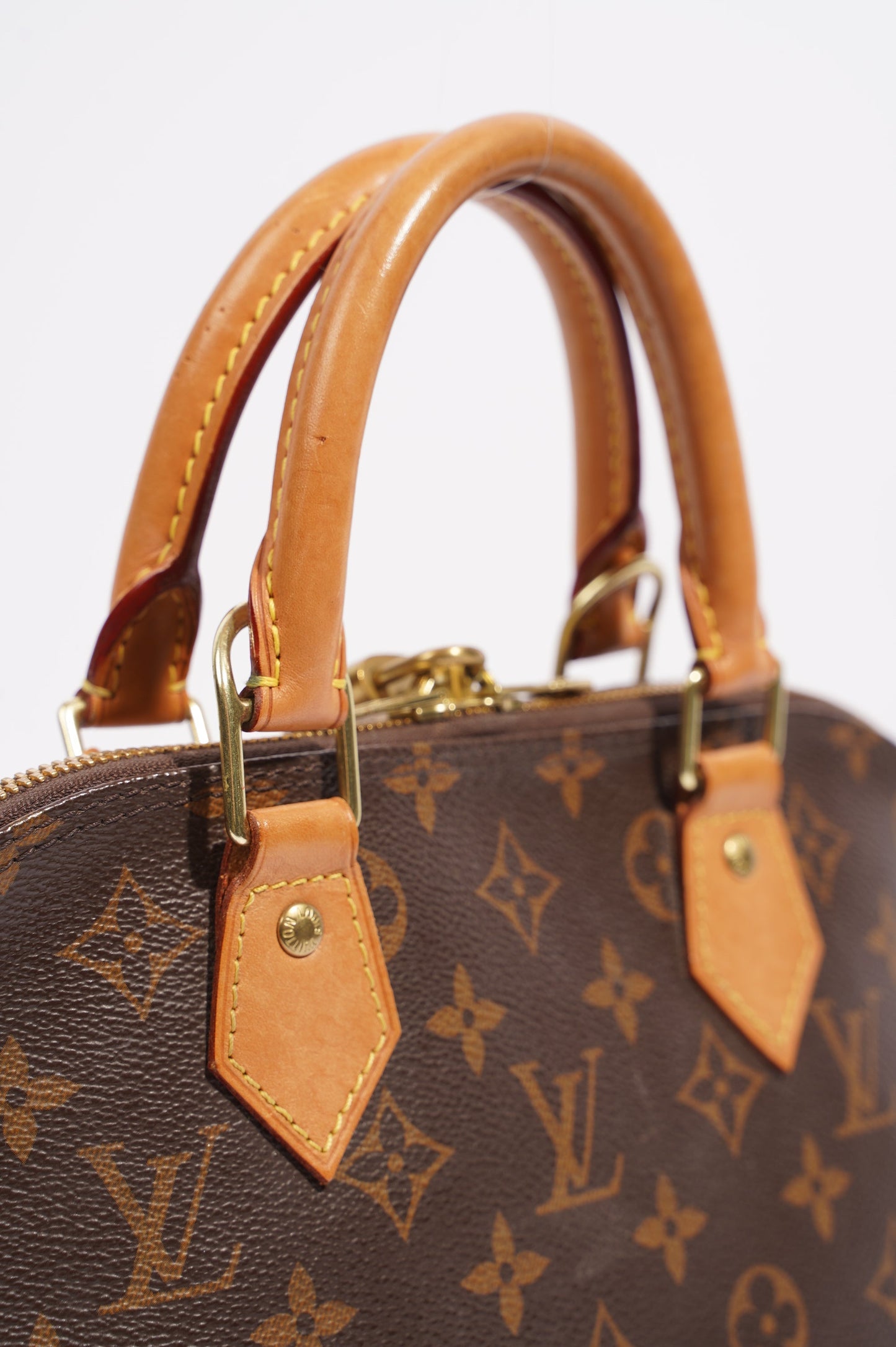 Louis Vuitton Womens Alma Monogram PM