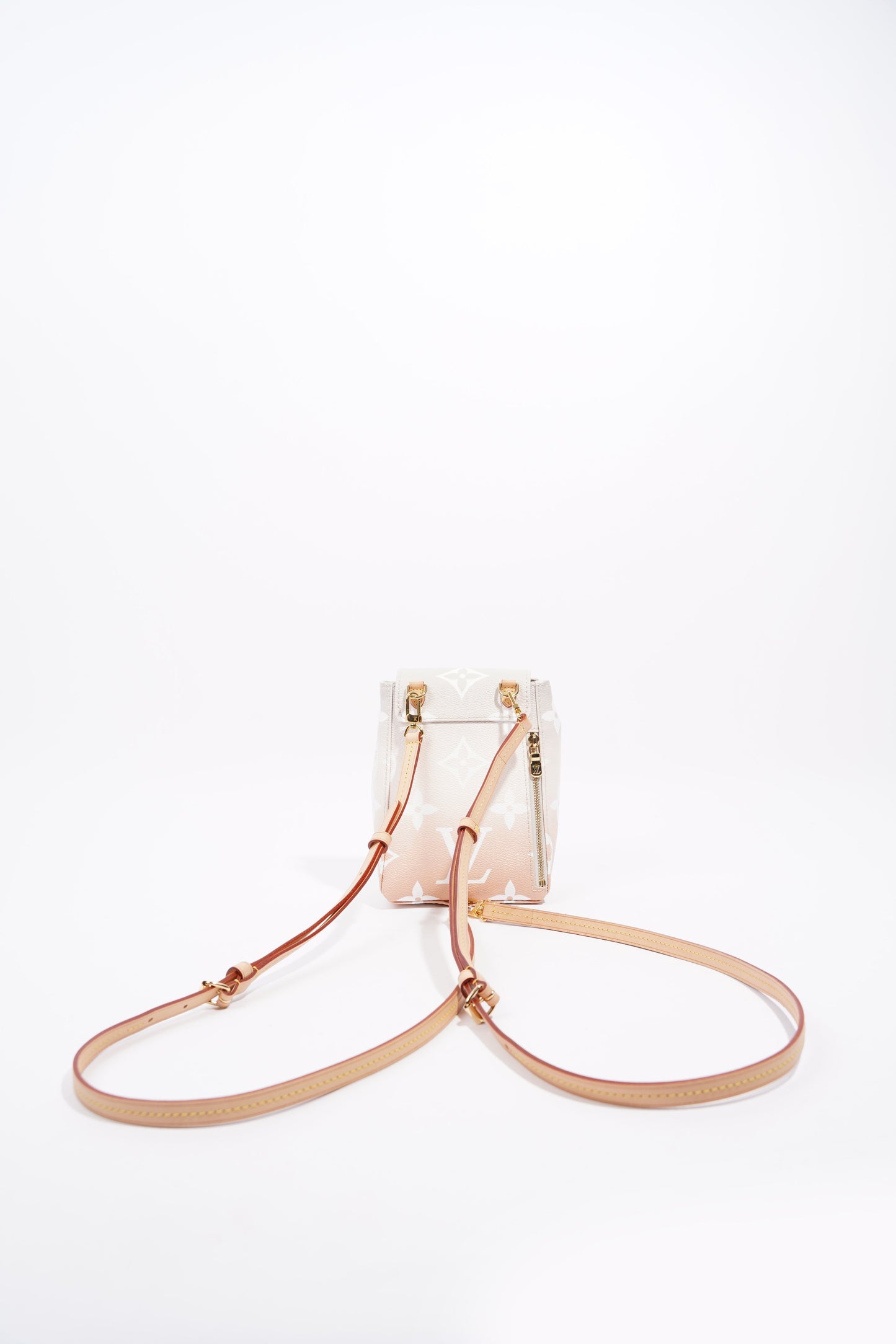 Louis Vuitton Womens Tiny Backpack By The Pool
