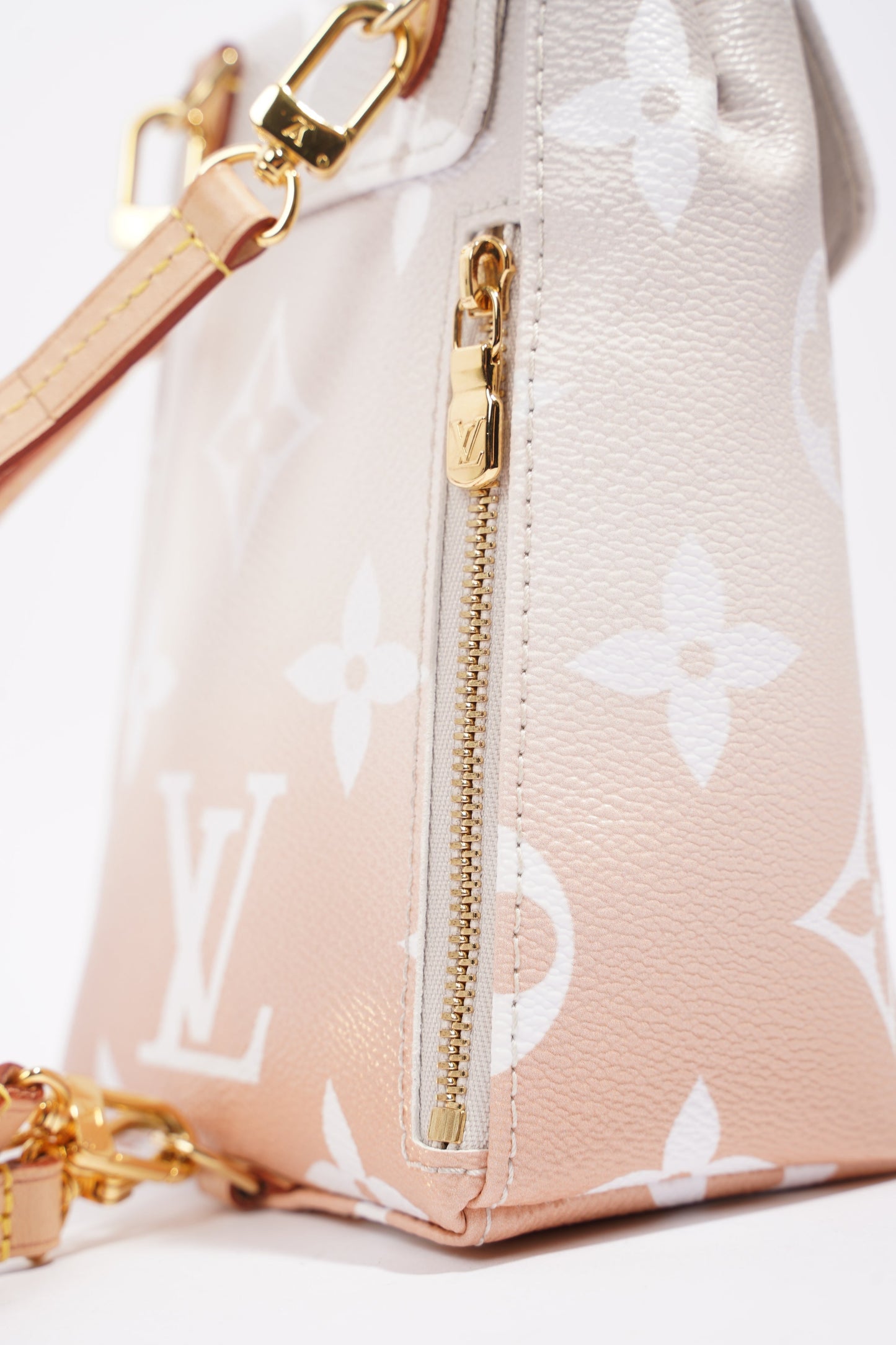 Louis Vuitton Womens Tiny Backpack By The Pool