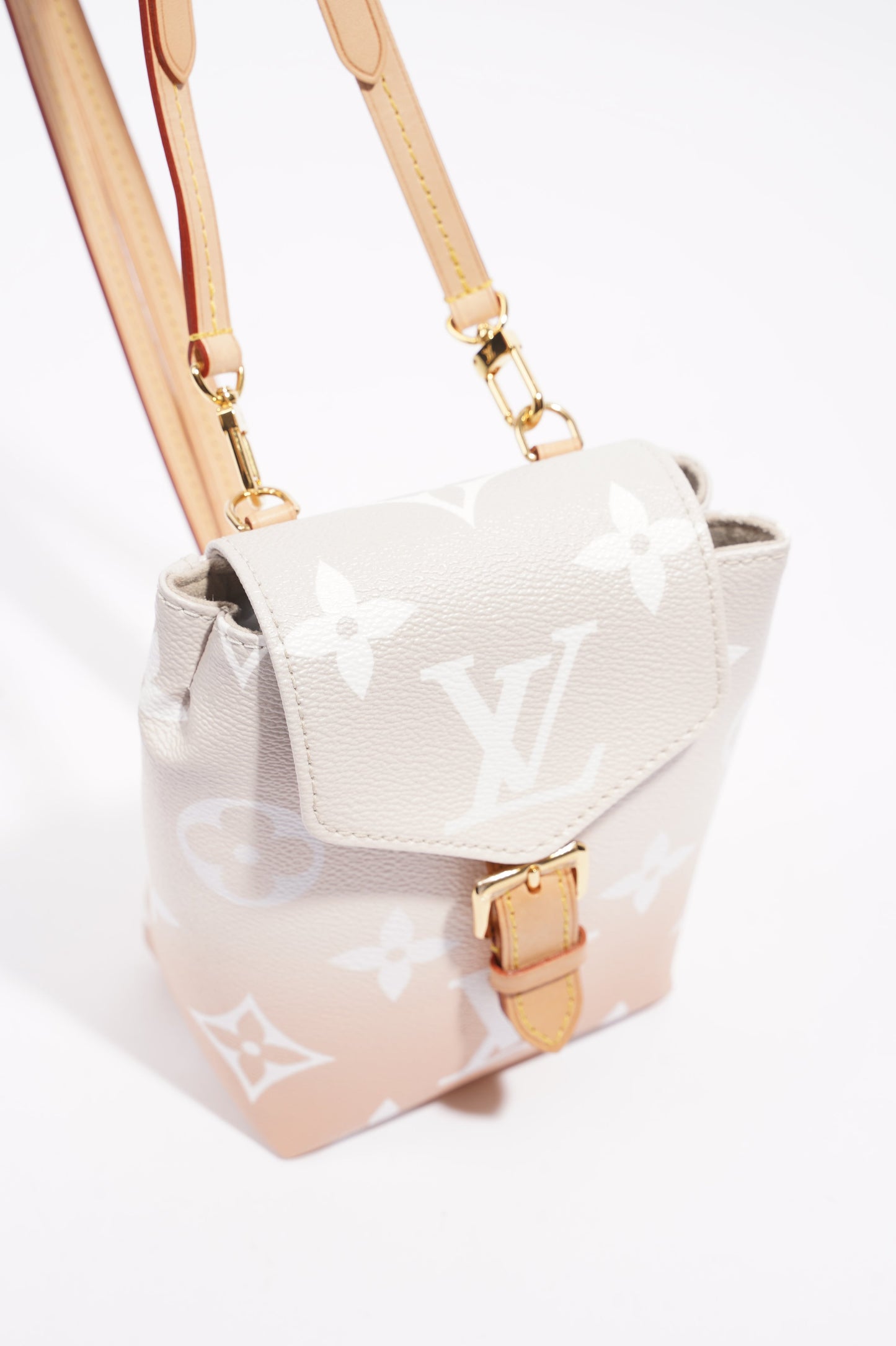 Louis Vuitton Womens Tiny Backpack By The Pool