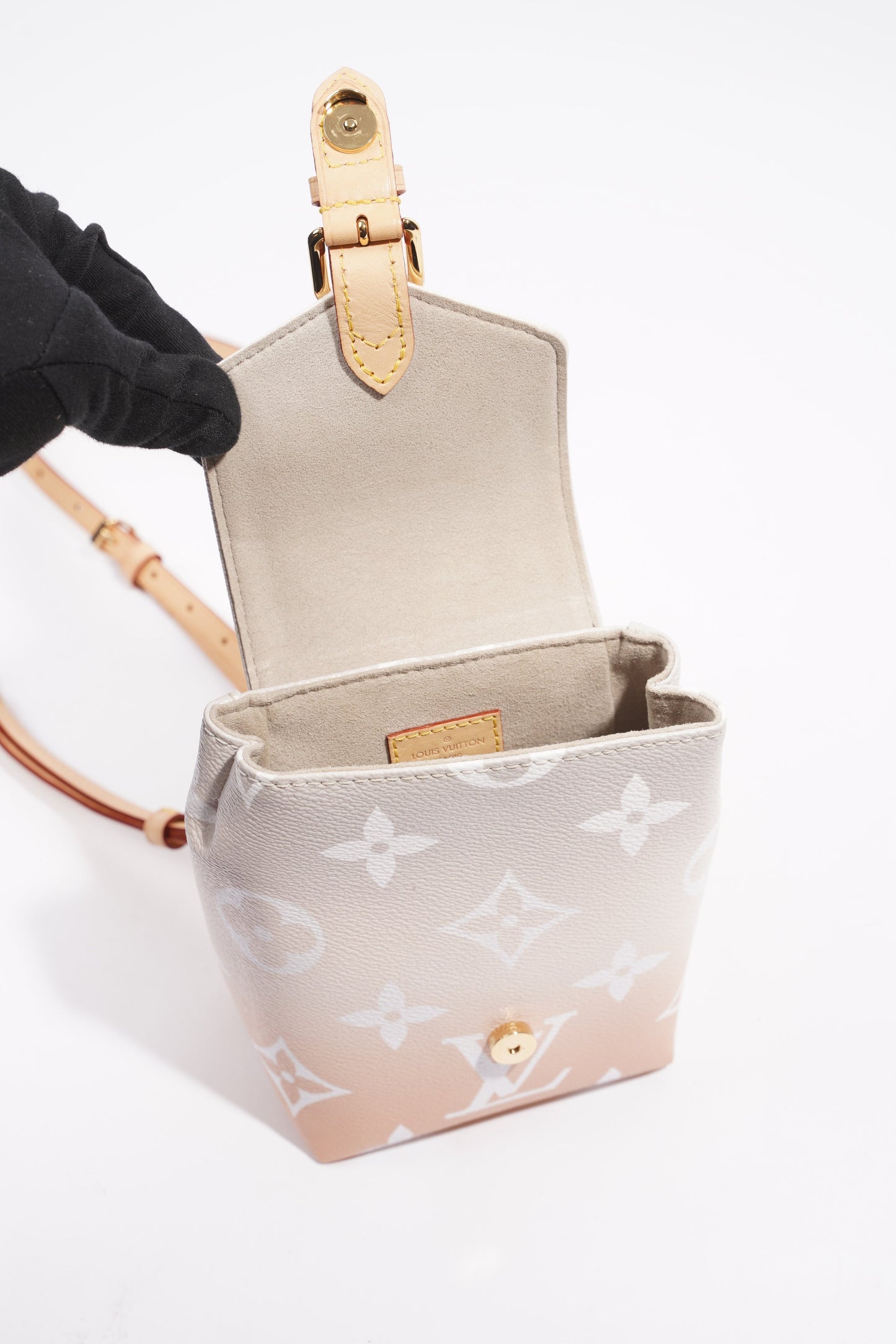 Louis Vuitton Womens Tiny Backpack By The Pool