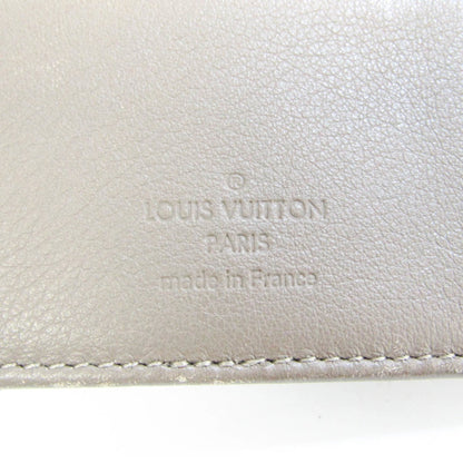 Louis Vuitton Beige Leather Mahina wallet accessories