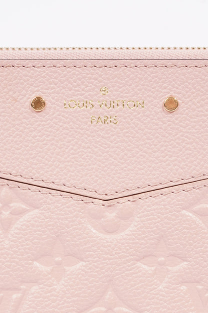 Louis Vuitton Womens Daily Pouch Pink Empreinte Leather