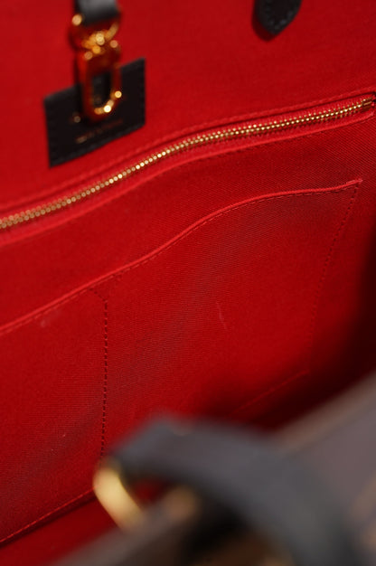 Louis Vuitton Womens On The Go Reverse Monogram GM