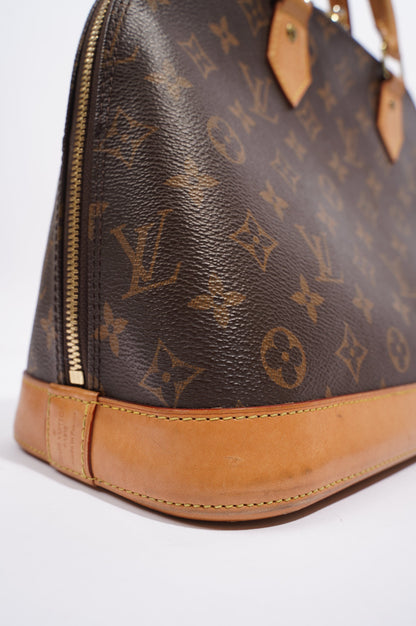 Louis Vuitton Womens Alma Monogram PM