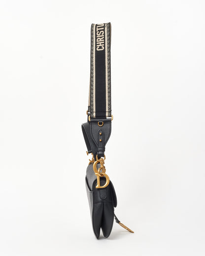 Dior Black Grained Leather Saddle Bag W/ Black & White Embroidered Guitar Strap